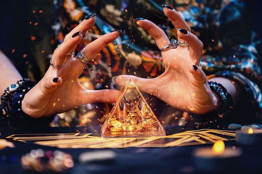 Spellcaster hands doing love spells
