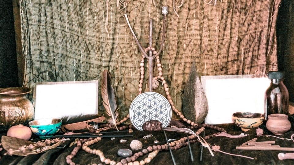 A neatly arranged notebook and safe ritual materials prepared for thoughtful love spell practice.