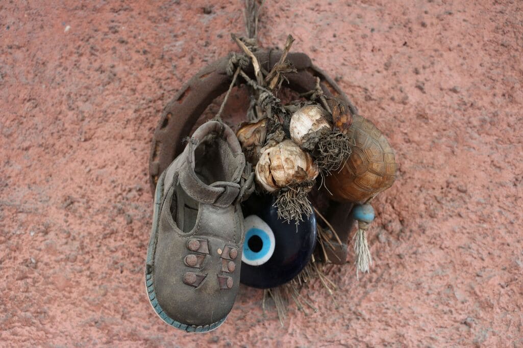 Protective spiritual symbol placed for ongoing protection after curse removal.
