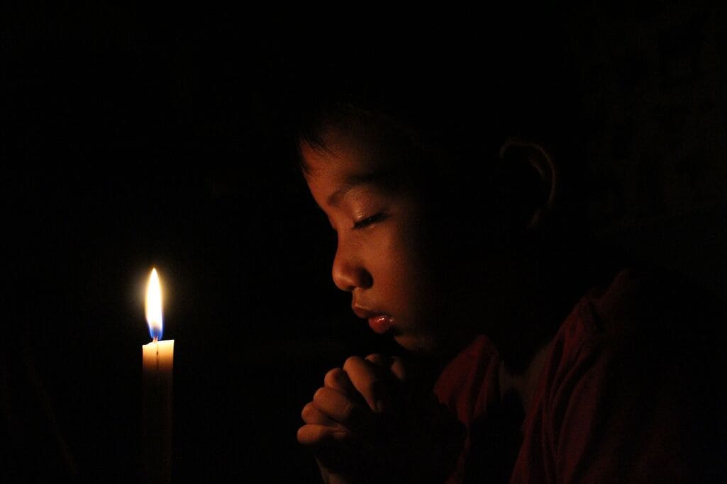 Ancestral Guidance: Listening to Those Who Came Before You 4 Quiet reflection during an ancestral invocation practice.